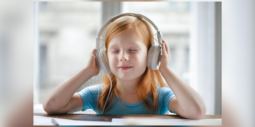 hearing screening - girl with headphones