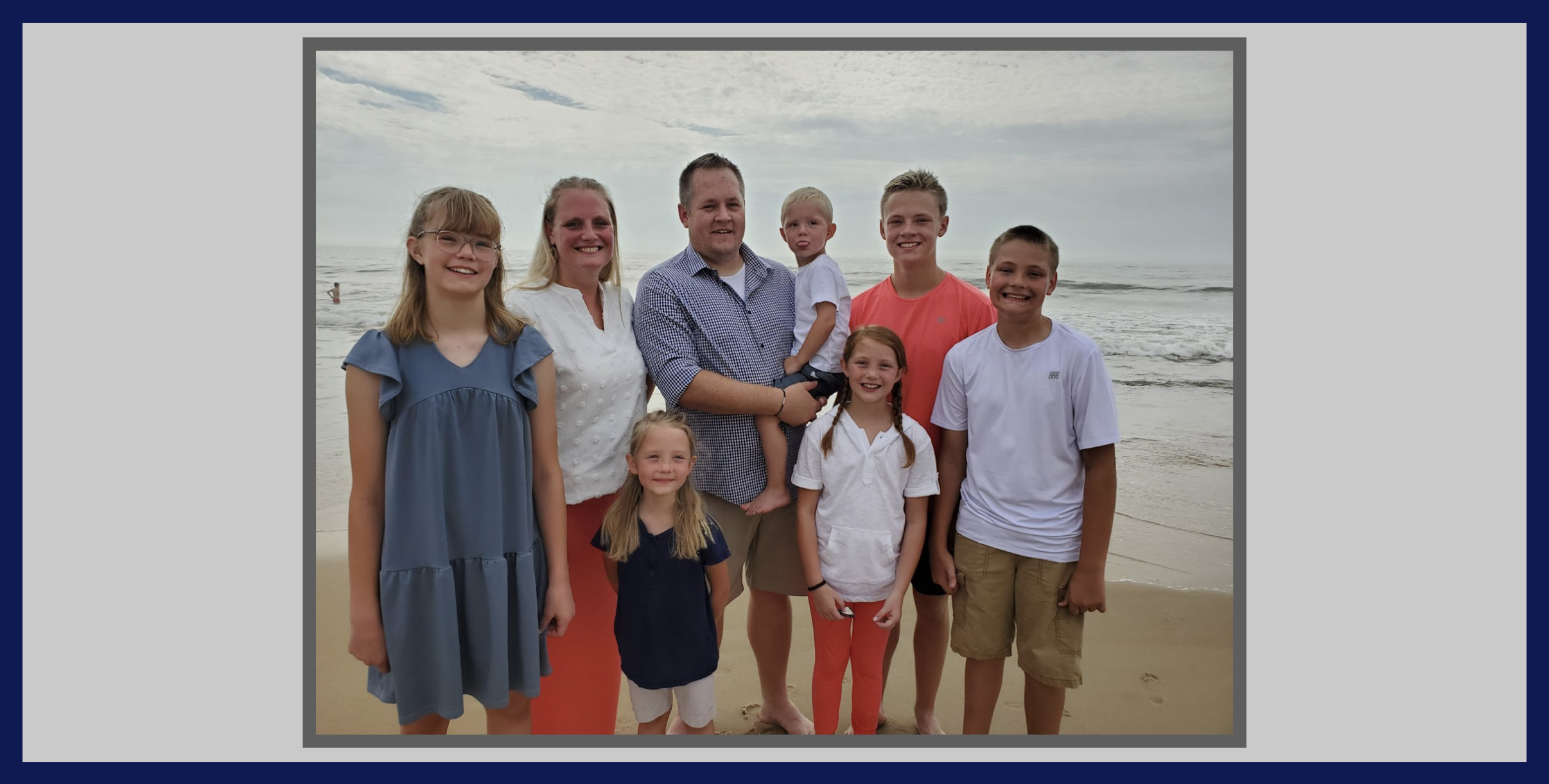 Mrs. Monn and with her family at the beach